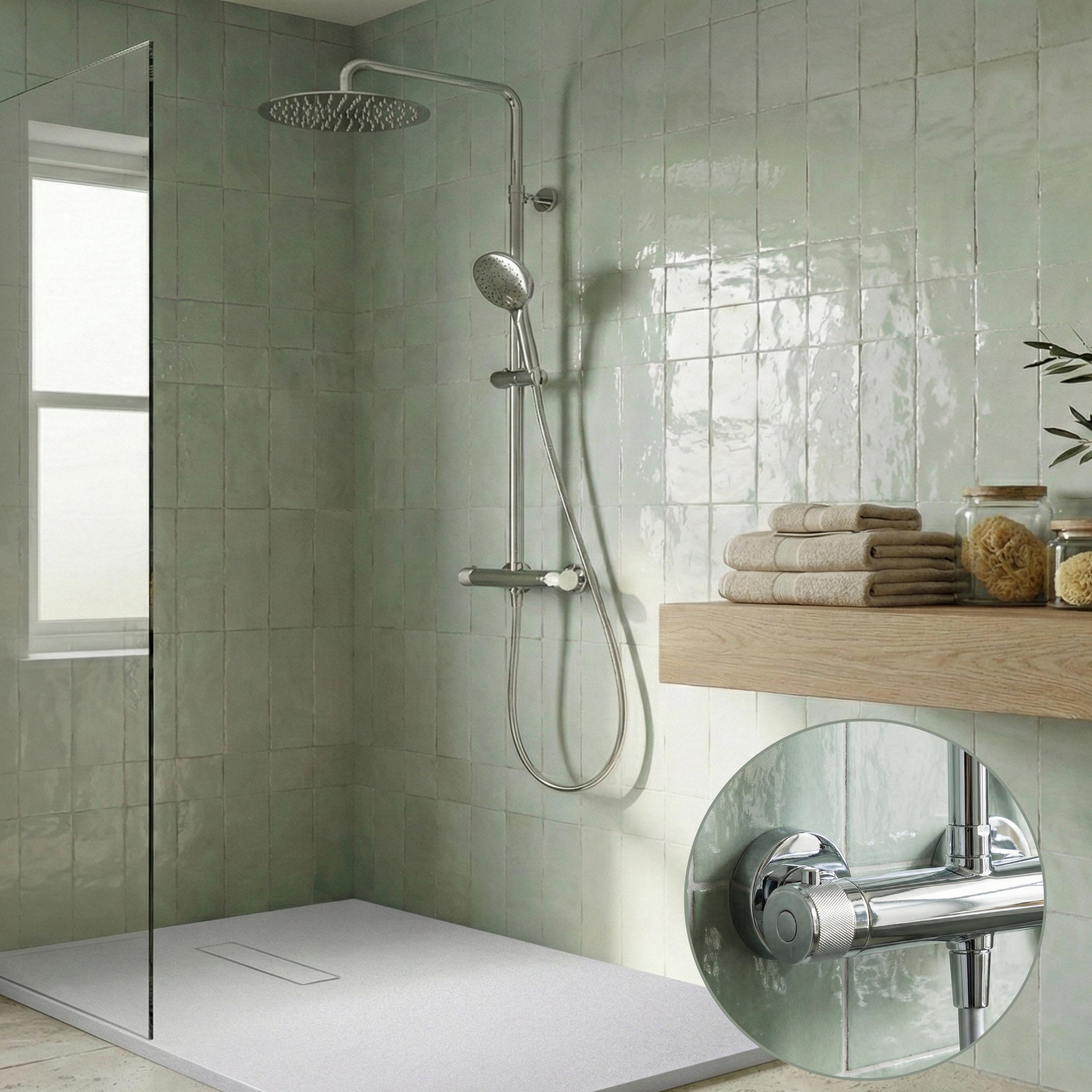 Colonne de douche thermostatique en inox avec tête ronde et poignées guillochées